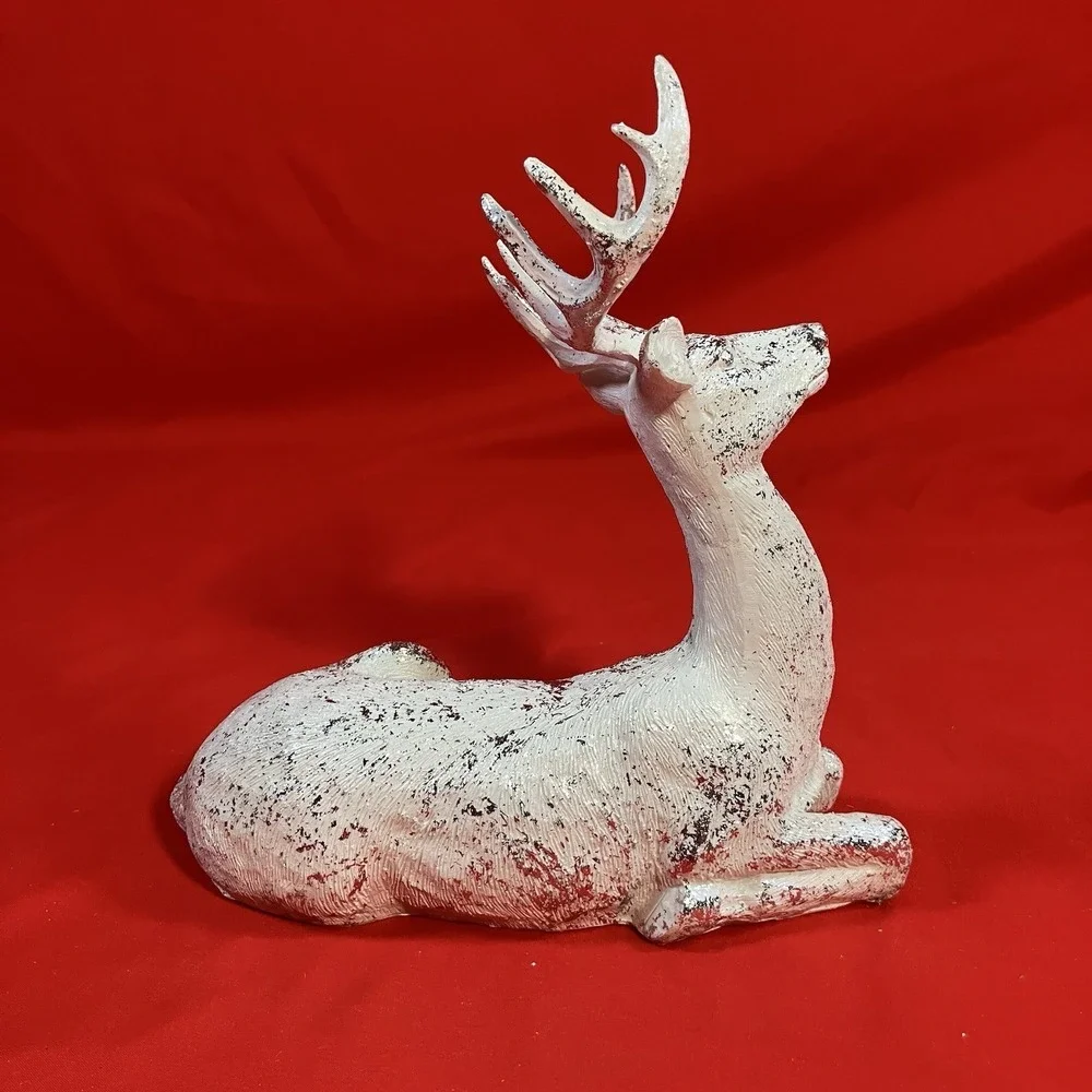 December Home reindeer laying